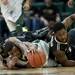 EMU freshman Jalen Ross scrambles for a ball in the game against Purdue on Saturday. Purdue leads at halftime 20-19. Daniel Brenner I AnnArbor.com